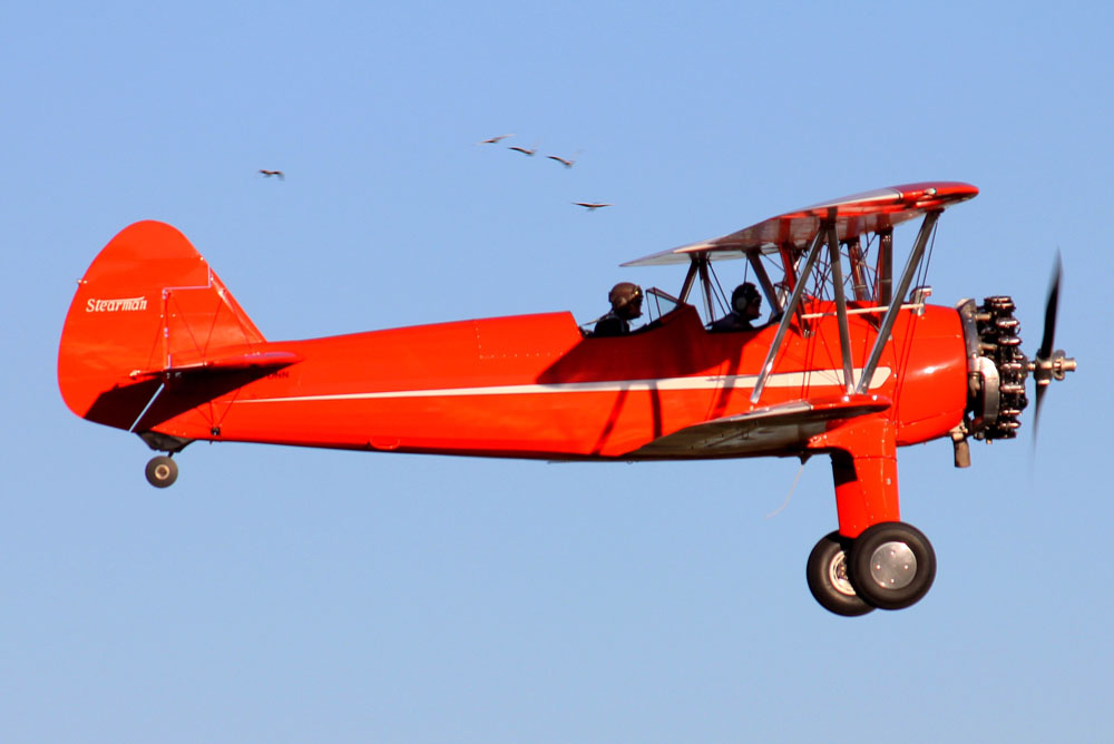 Stearman plane flying in the sky