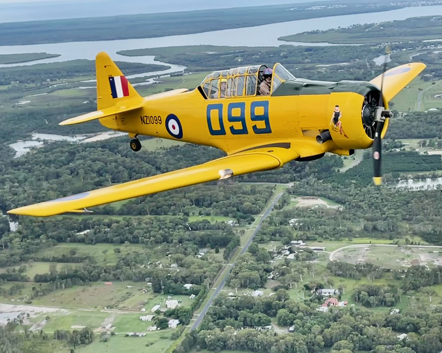Harvard plane flying