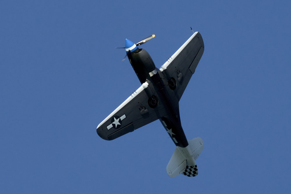 Kittyhawk plane doing aerobatics