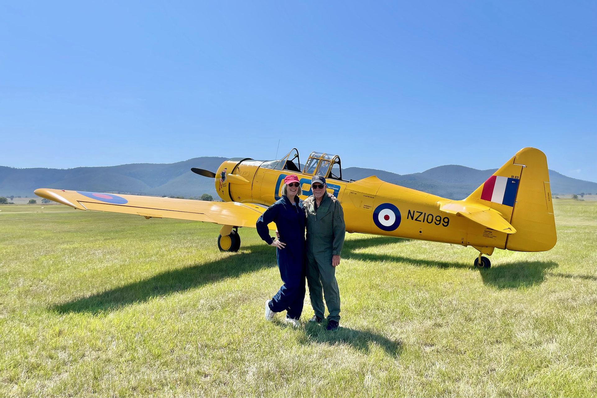 Ross and Robyn in front of the Warbird Harvard plane
