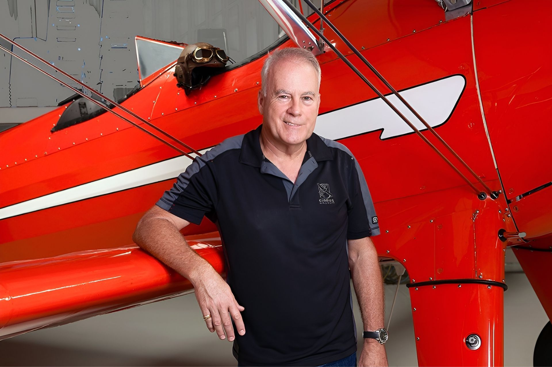 Ross from Warbird in front of the Stearman plane